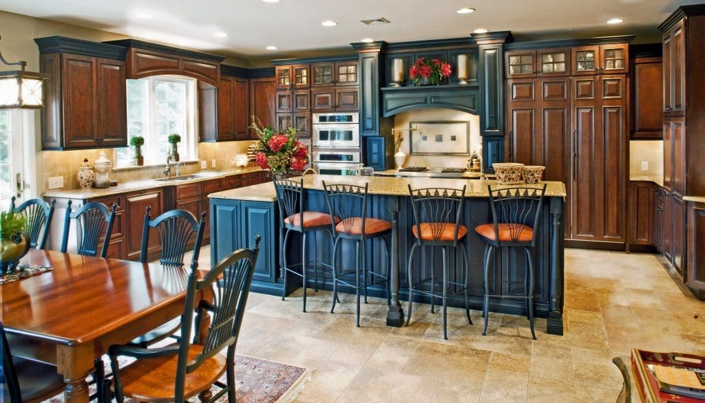 A new kitchen with a teal colored bar.