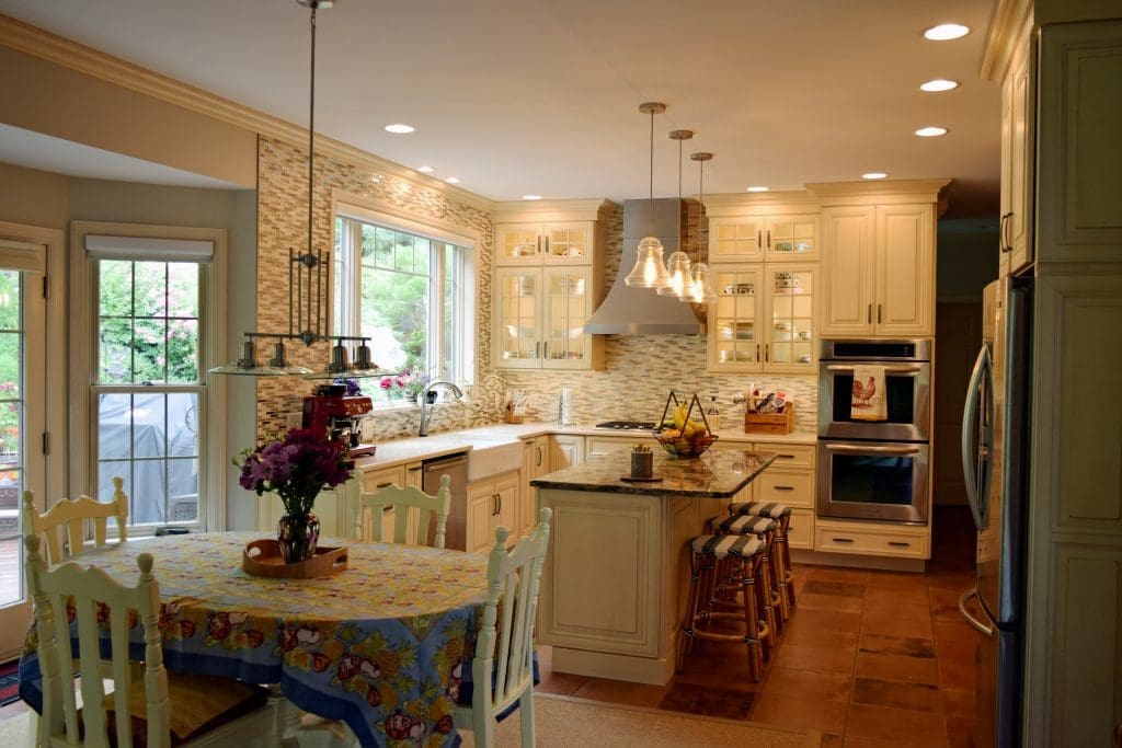 A custom kitchen with tile walls.