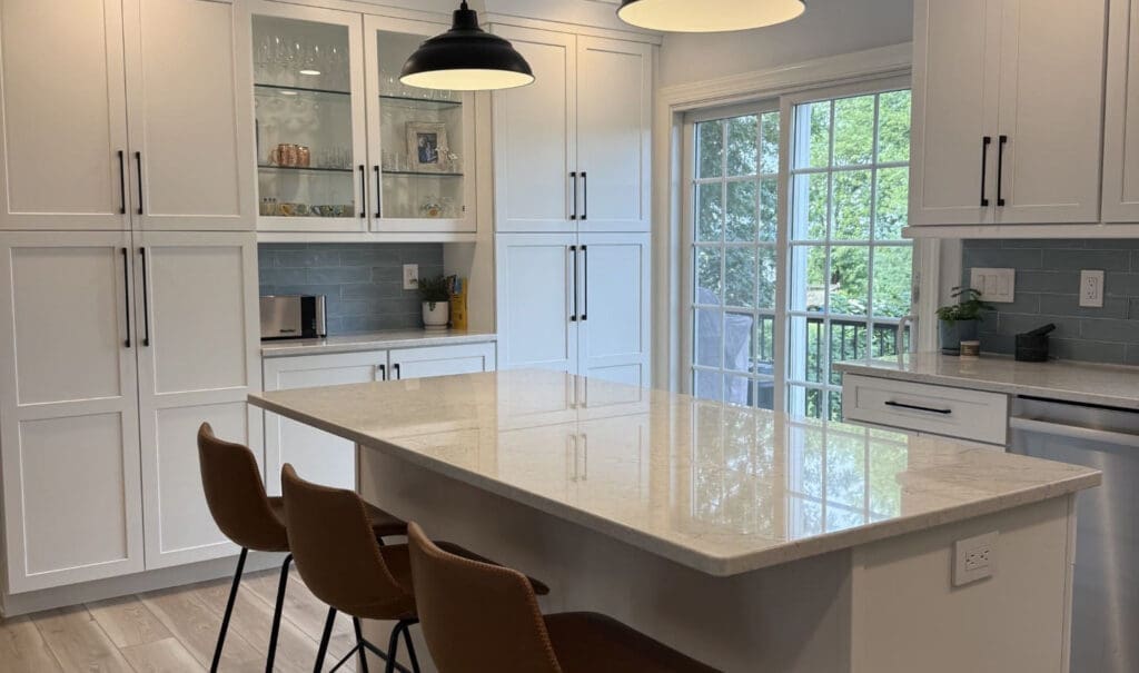 A kitchen with a bar area.